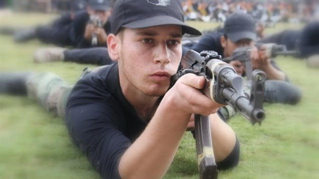 HAMAS child soldier firing ak47
