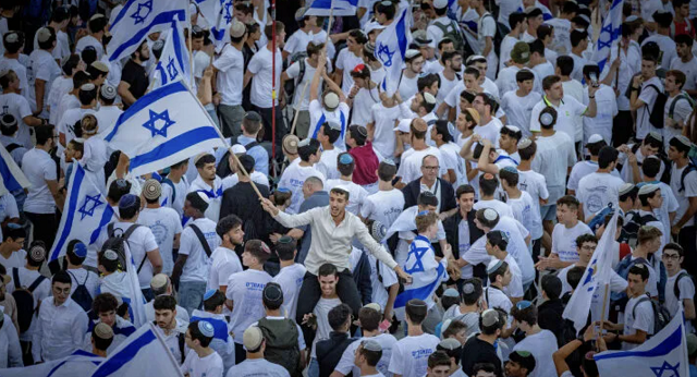 Despite War, Israel Ranks 5th in World Happiness Report thumbnail