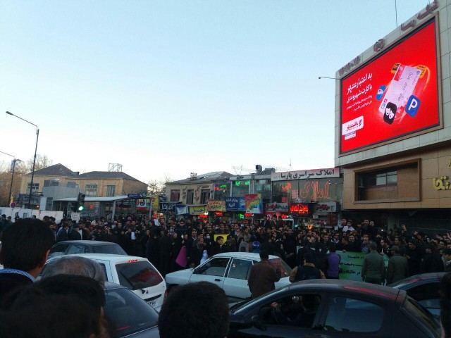 iran protester in street
