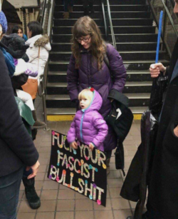 mother daughter racist sign