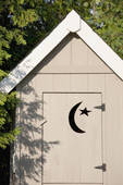 outhouse with Muslim symbol