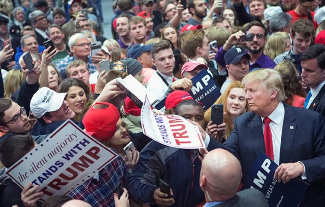 trump at rally with supporters